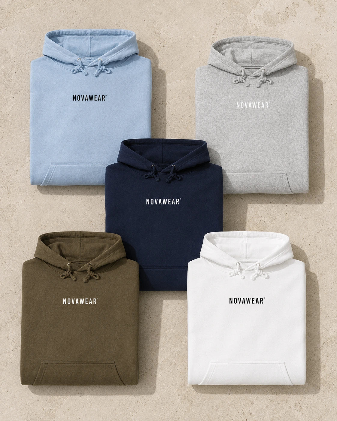 NOVAWEAR Hoodie – Flatlay in kühlen und neutralen Farbtönen